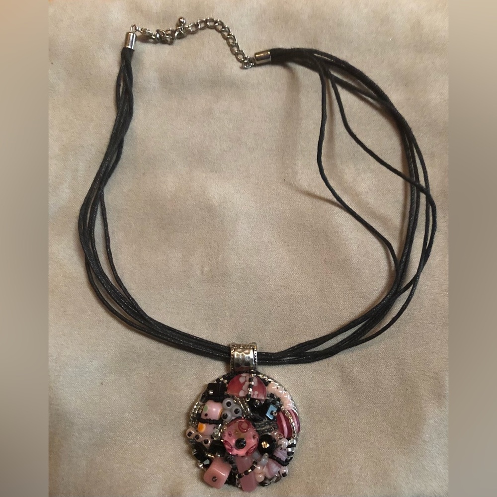 Rope necklace silver with pink and black stones.
